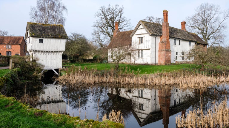 The house and moat at Brockhampton in the winter